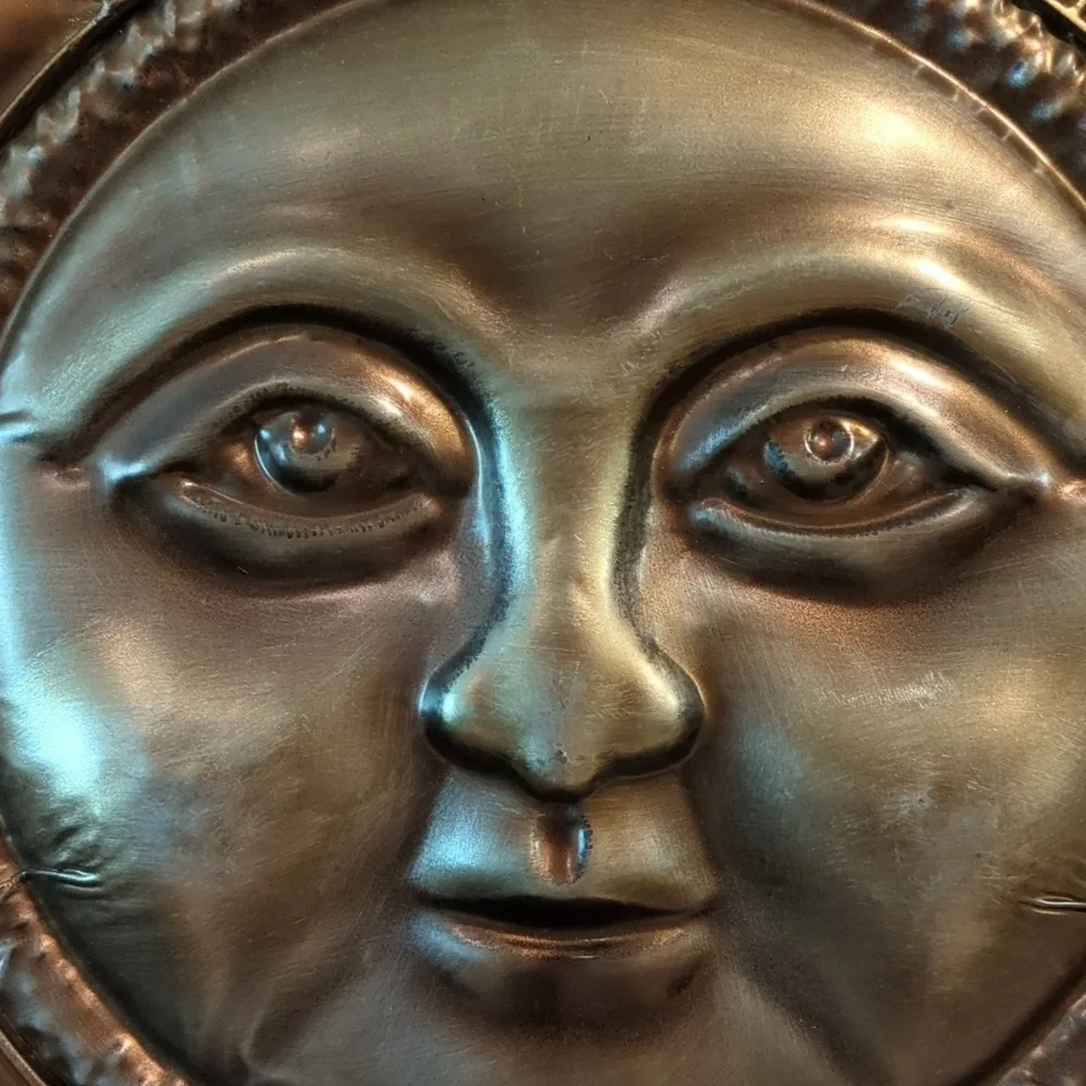 Decorative metal sun for patio enclosure lanai sunroom.